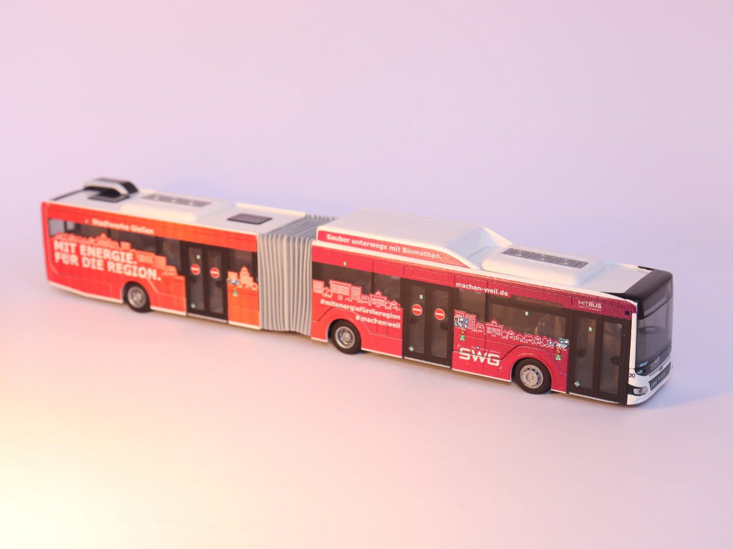 MAN Lion s City 18 G, Mit.Bus Gießen, SWG Stadtwerke Gießen 2018 Modellbus Rietze 75831