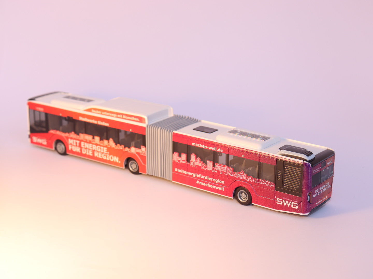 MAN Lion s City 18 G, Mit.Bus Gießen, SWG Stadtwerke Gießen 2018 Modellbus Rietze 75831