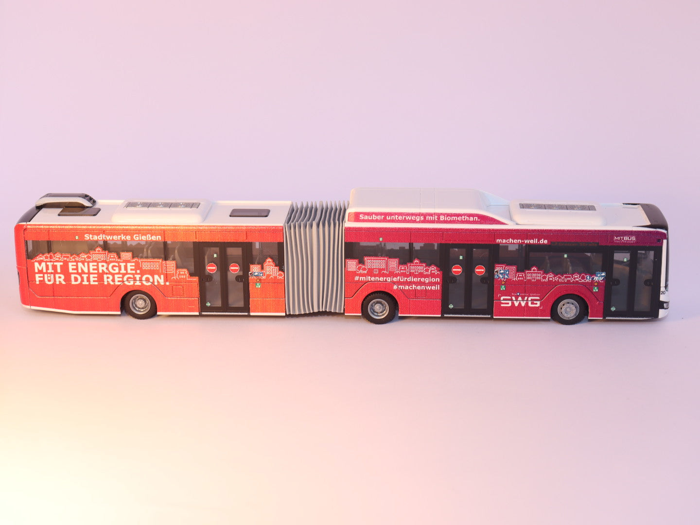 MAN Lion s City 18 G, Mit.Bus Gießen, SWG Stadtwerke Gießen 2018 Modellbus Rietze 75831