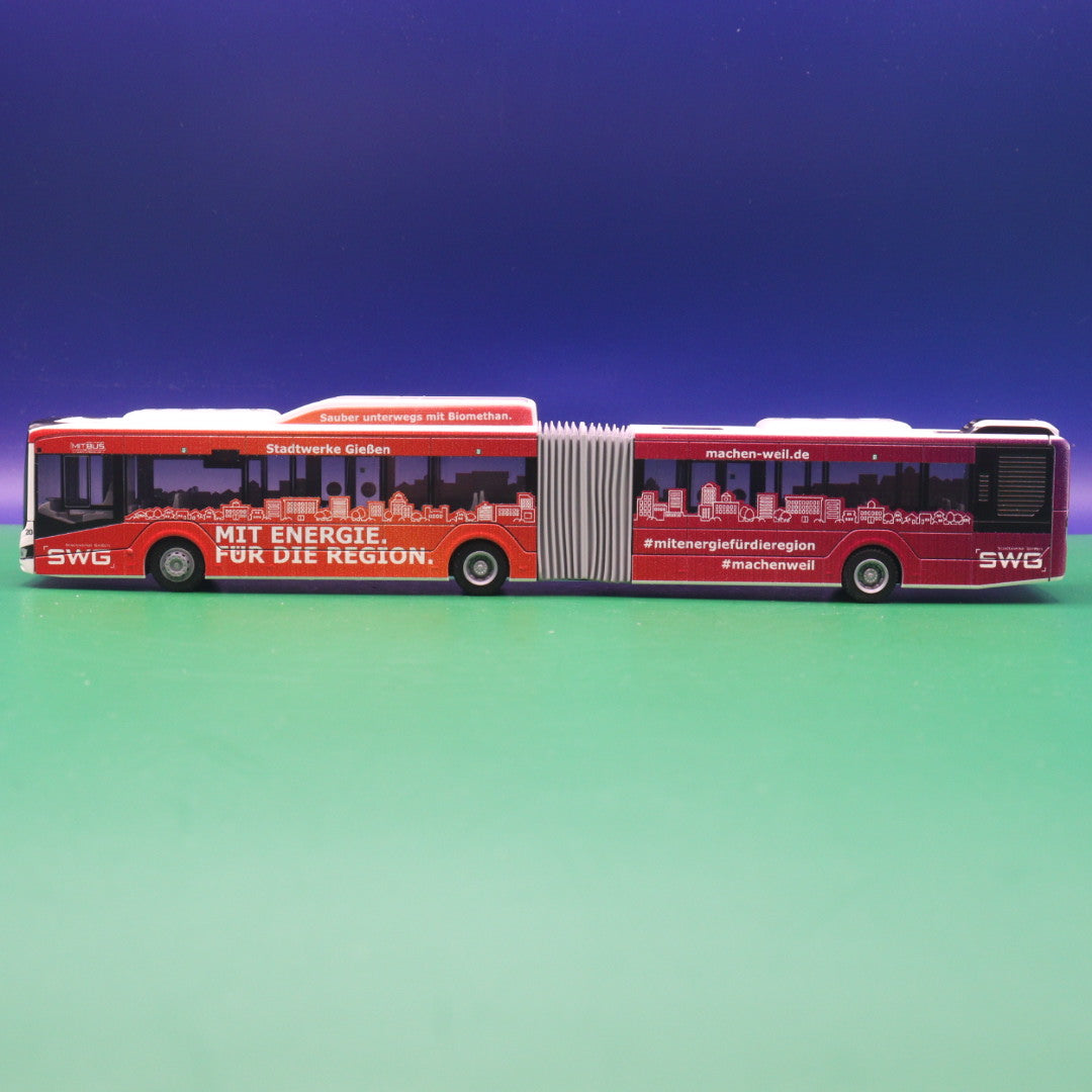 MAN New Lions City 18 - SWG - Mit Bus Gießen - Sauber unterwegs mit Biomethan - Modellbus Rietze 75831