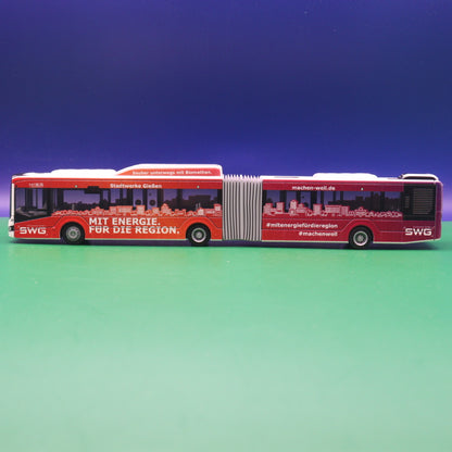 MAN New Lions City 18 - SWG - Mit Bus Gießen - Sauber unterwegs mit Biomethan - Modellbus Rietze 75831