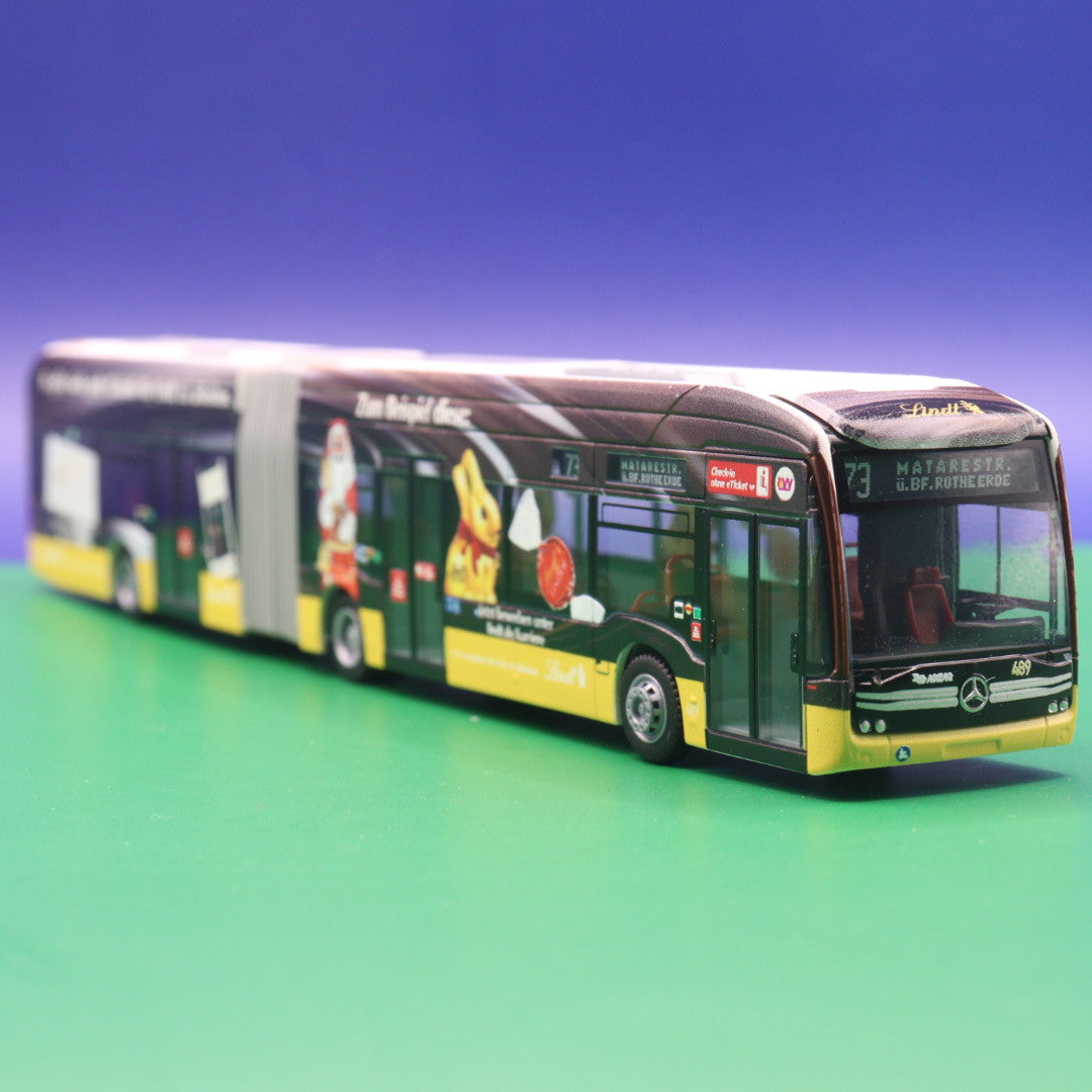 Mercedes Benz eCitaro G - Lindt Schokolade - ASEAG Aachen - Modellbus Rietze 77615